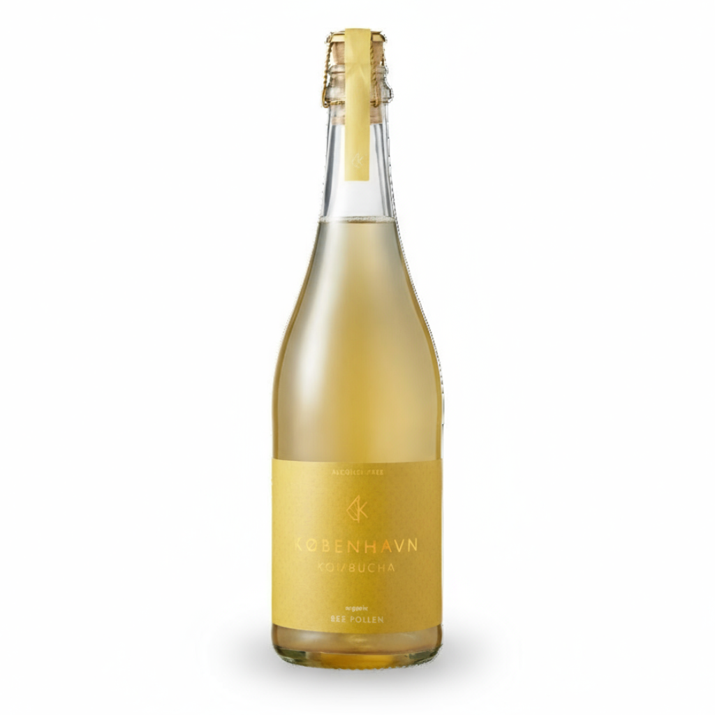 Honigpollen von København Kombucha, alkoholfrei, in einer transparenten Verpackung, zeigt die goldene Pollenstruktur.